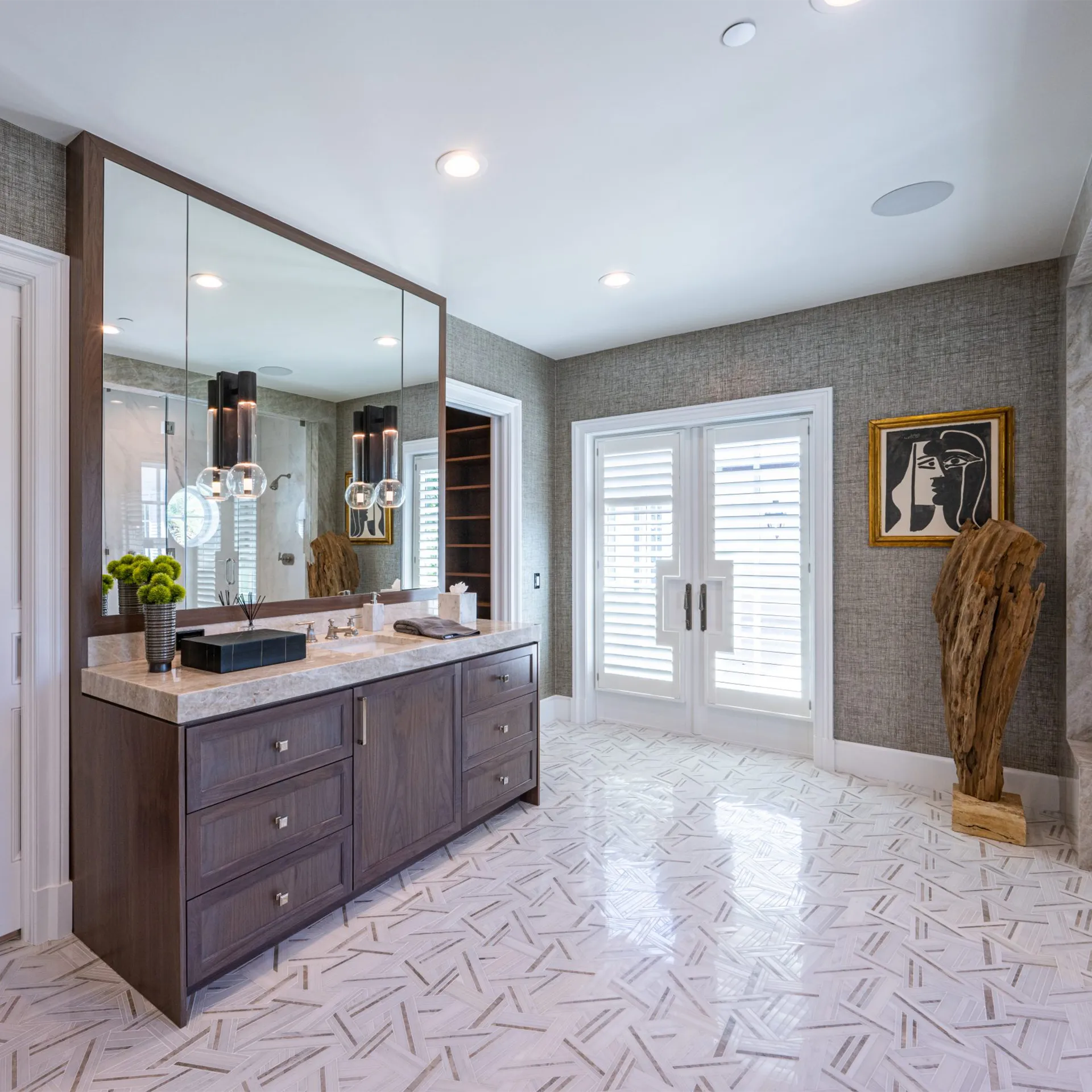 Opulent Dolomite bathroom showcasing a stunning mirror above a chic sink, exuding sophistication and grace.