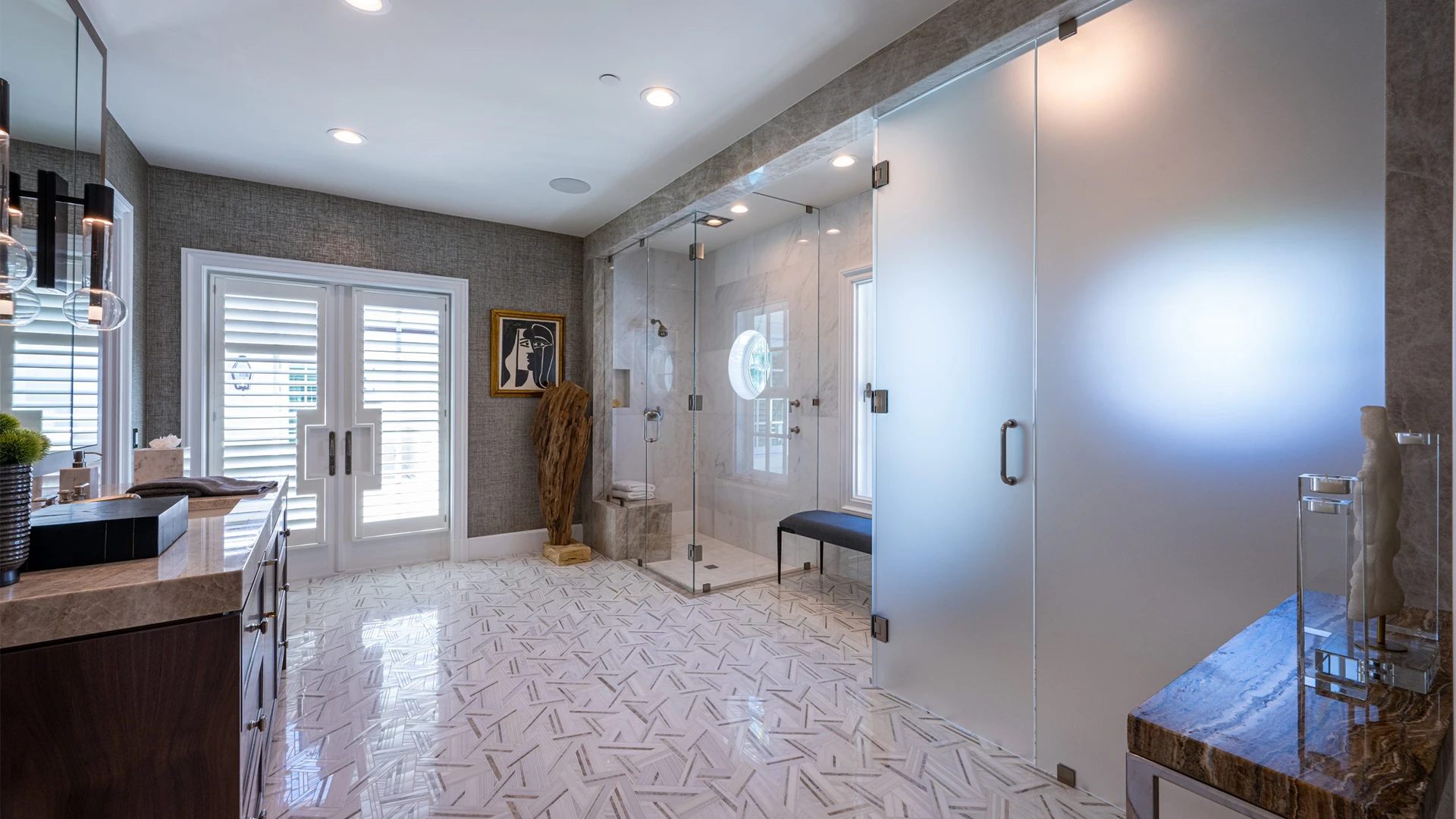 Polished bathroom with a stylish glass door and a roomy shower.