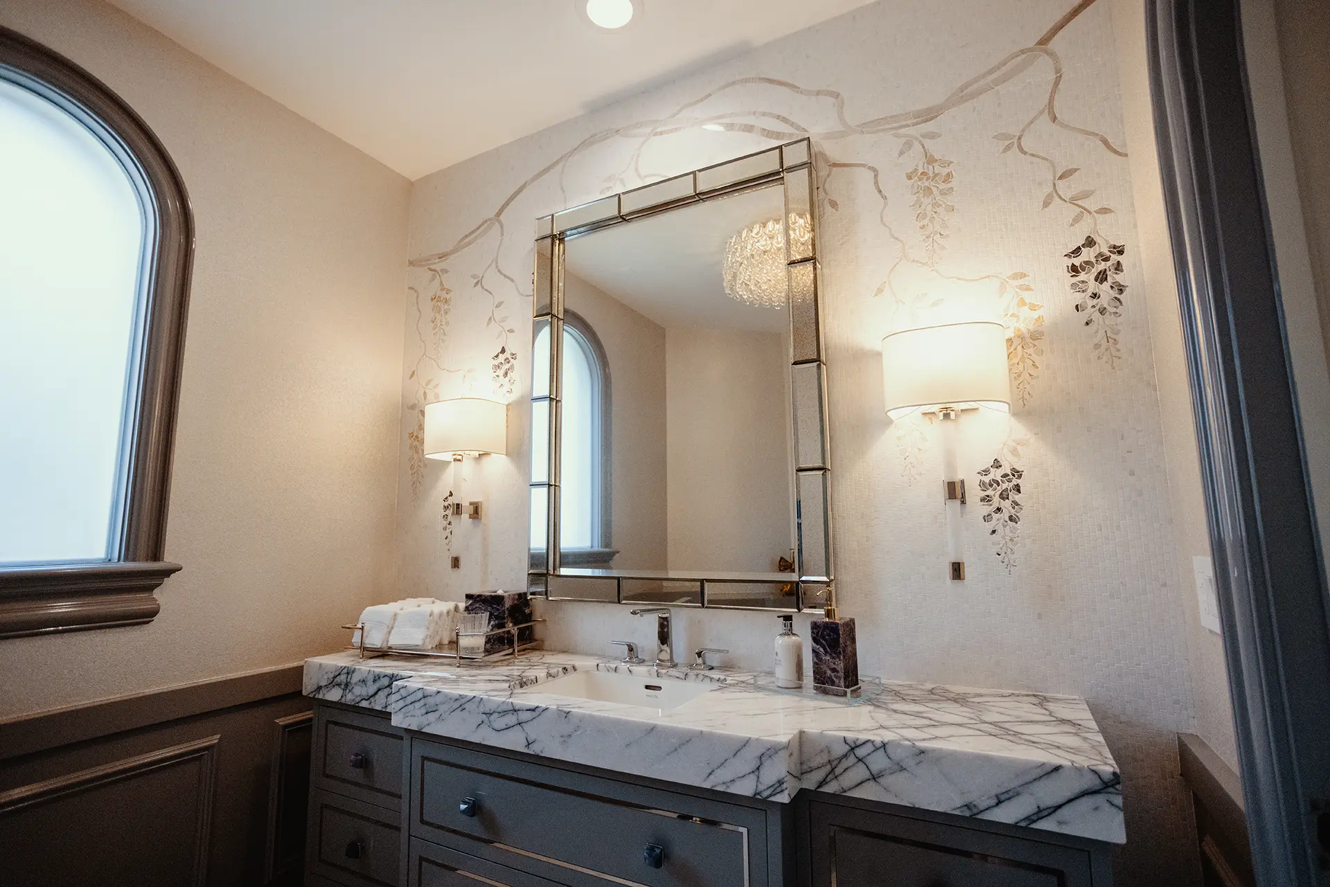 Luxurious bathroom featuring a High Gloss Lacquer Vanity in Moonlit Orchid, crowned with a 4-inch mitered Lilac Marble top, and a Wisteria Stone Waterjet Mosaic backdrop